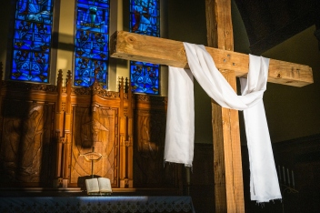 The altar and a wooden cross setup for Easter at St. Johns Lutheran Church on Tuesday, April 21, 2020, in St. Louis. LCMS Communications/Erik M. Lunsford